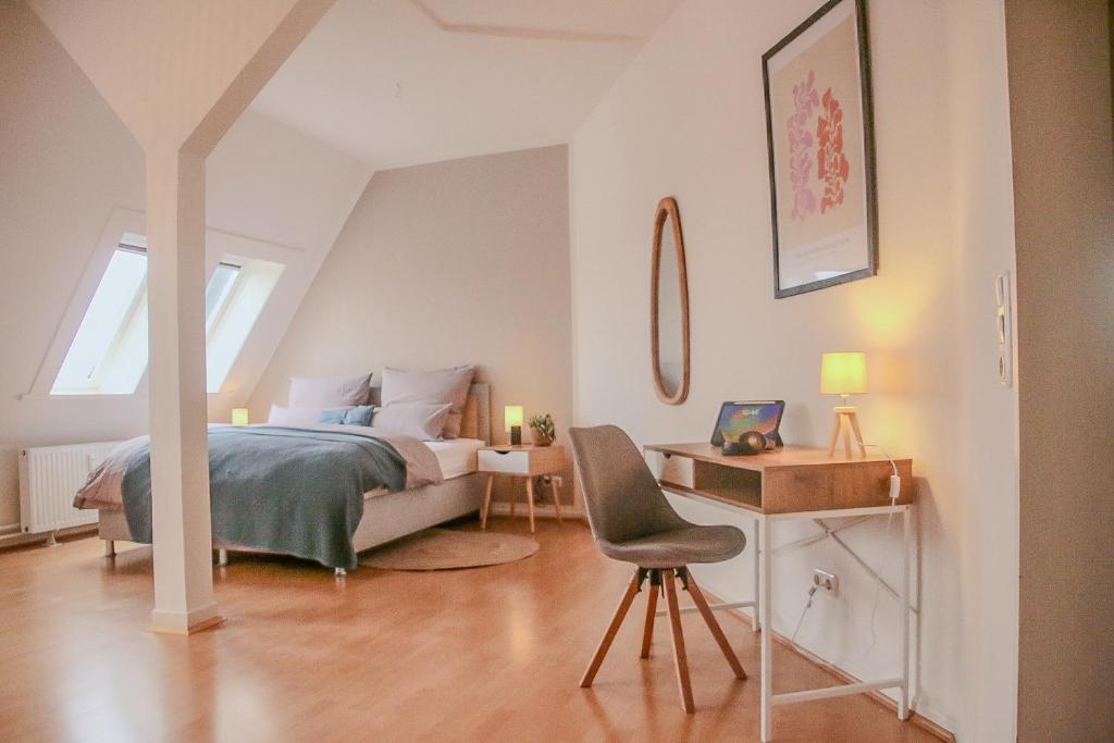 Ένα ή περισσότερα κρεβάτια σε δωμάτιο στο Hygge Homes - Traumhafte Altbauwohnung nahe Lüneburgs Altstadt