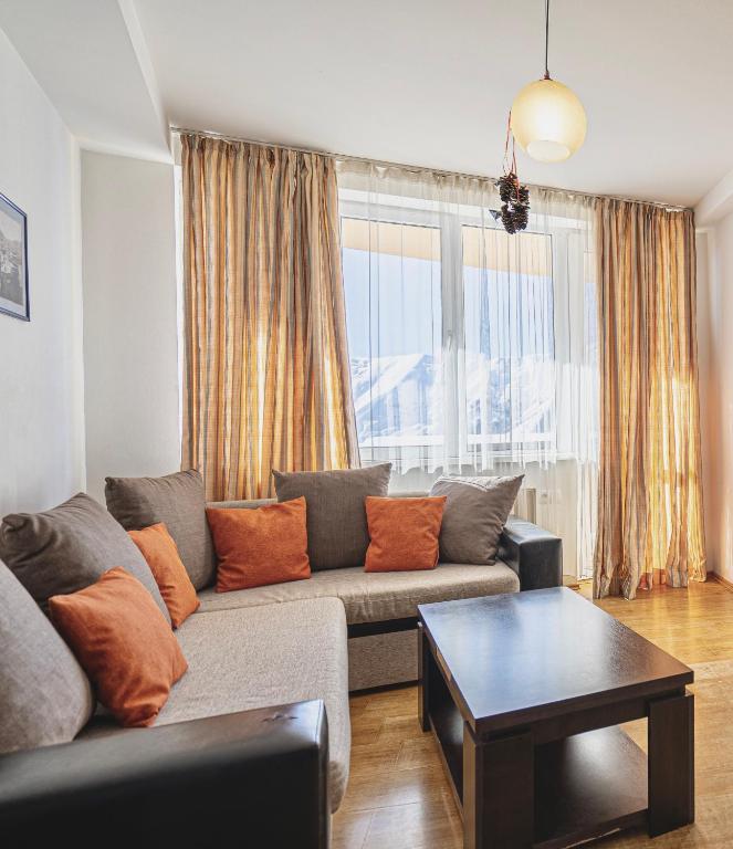 Posezení v ubytování 3-room apartment NFT Gudauri Penta 301