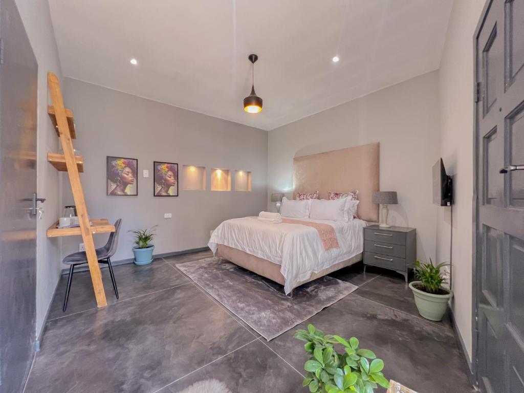 Letto o letti in una camera di Amoris Guesthouse - Sandton