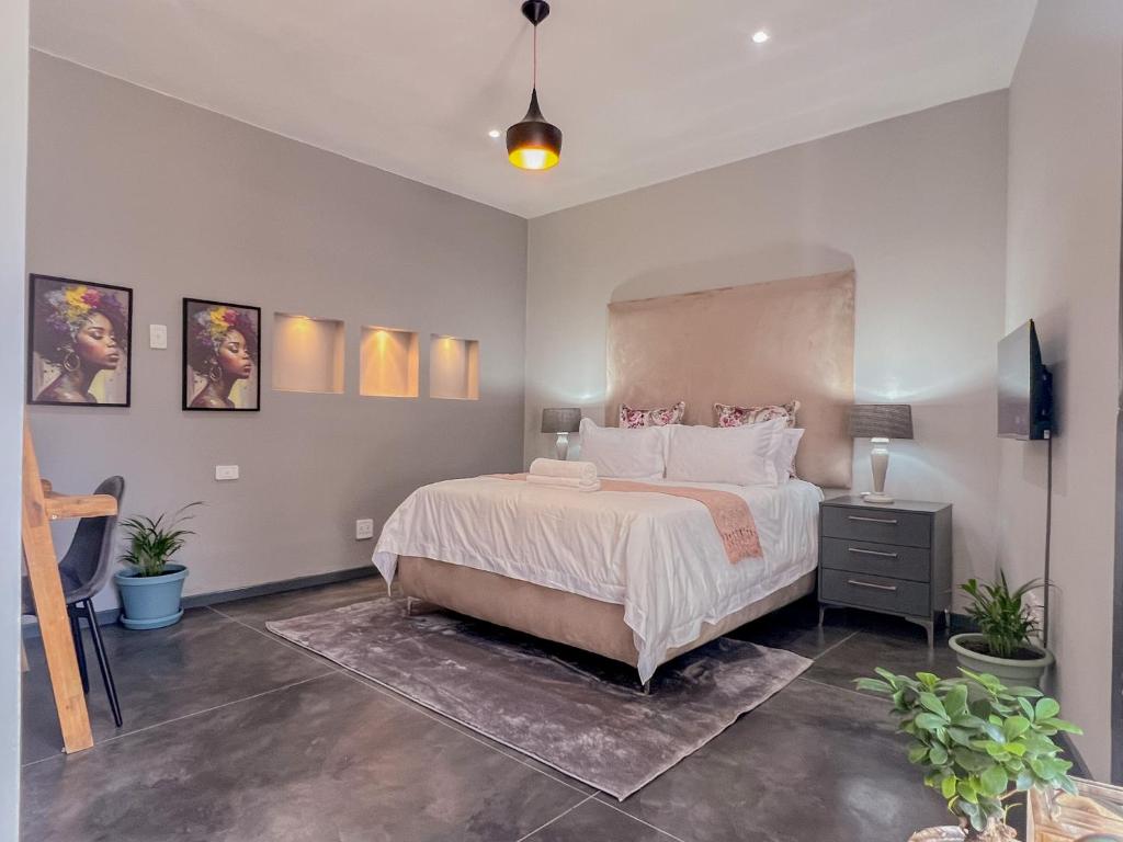 Letto o letti in una camera di Amoris Guesthouse - Sandton
