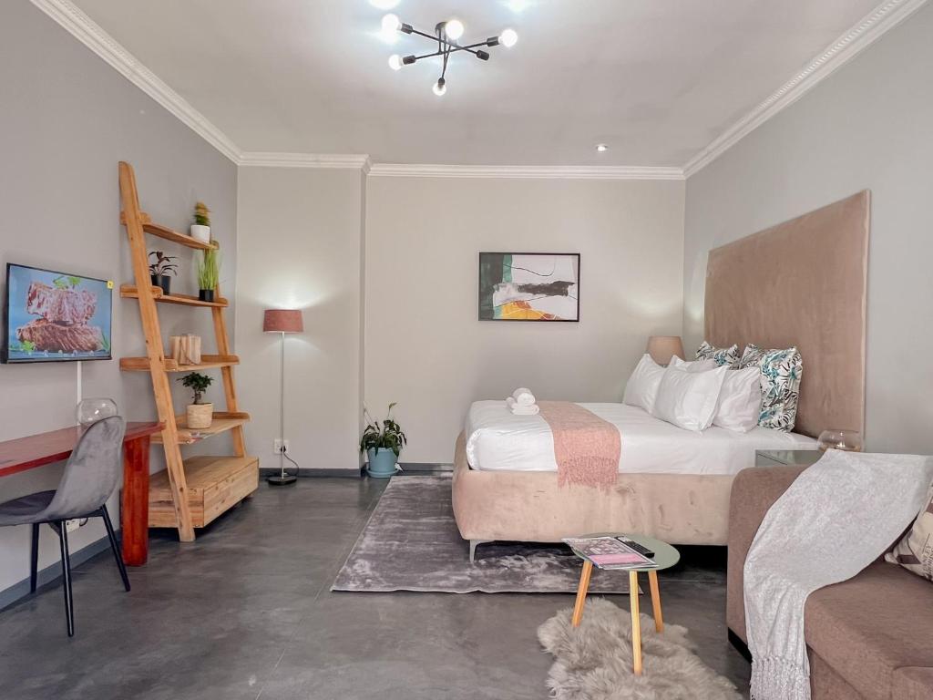 Letto o letti in una camera di Amoris Guesthouse - Sandton