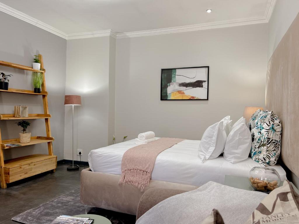 Letto o letti in una camera di Amoris Guesthouse - Sandton