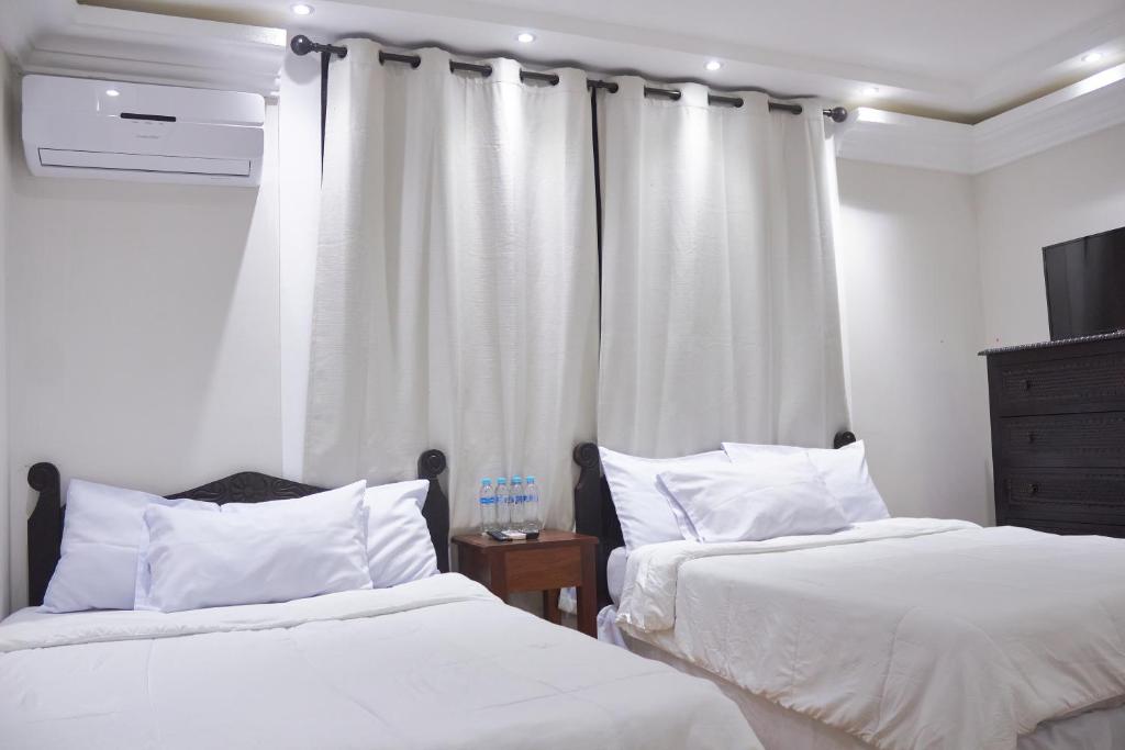 Een bed of bedden in een kamer bij Hotel Villa Antigua