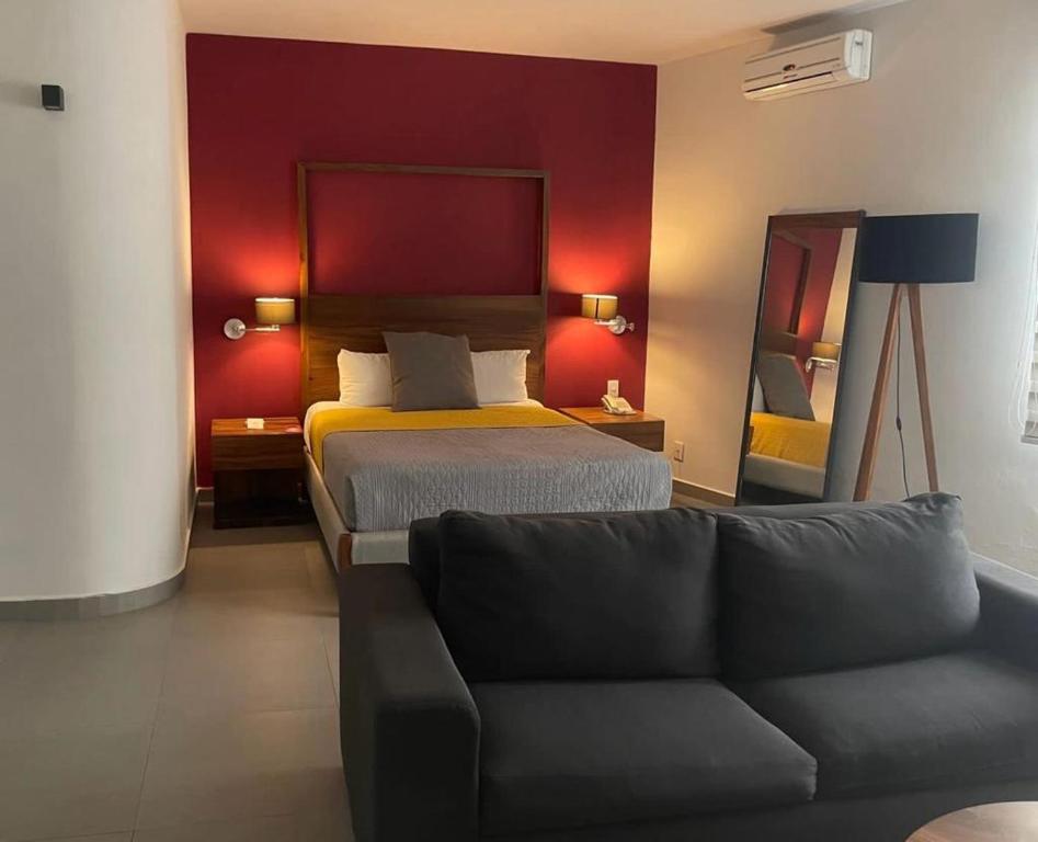 Postel nebo postele na pokoji v ubytování Hotel Boutique Abad