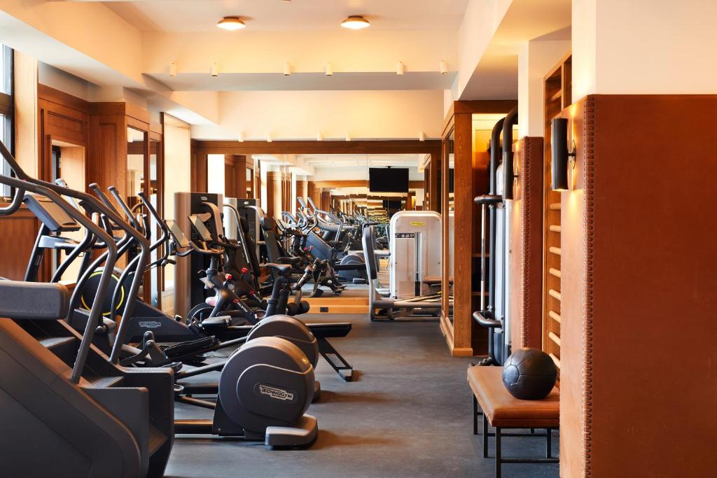 a gym filled with lots of treadmills and machines at Shinola Hotel in Detroit