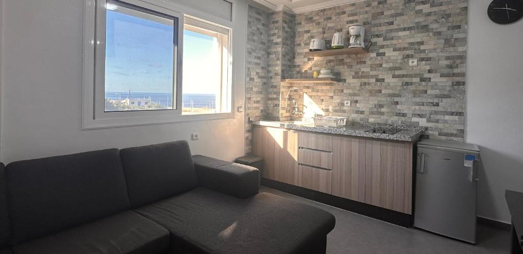 Kuchyň nebo kuchyňský kout v ubytování Hotel Cataleya Al-Hoceima