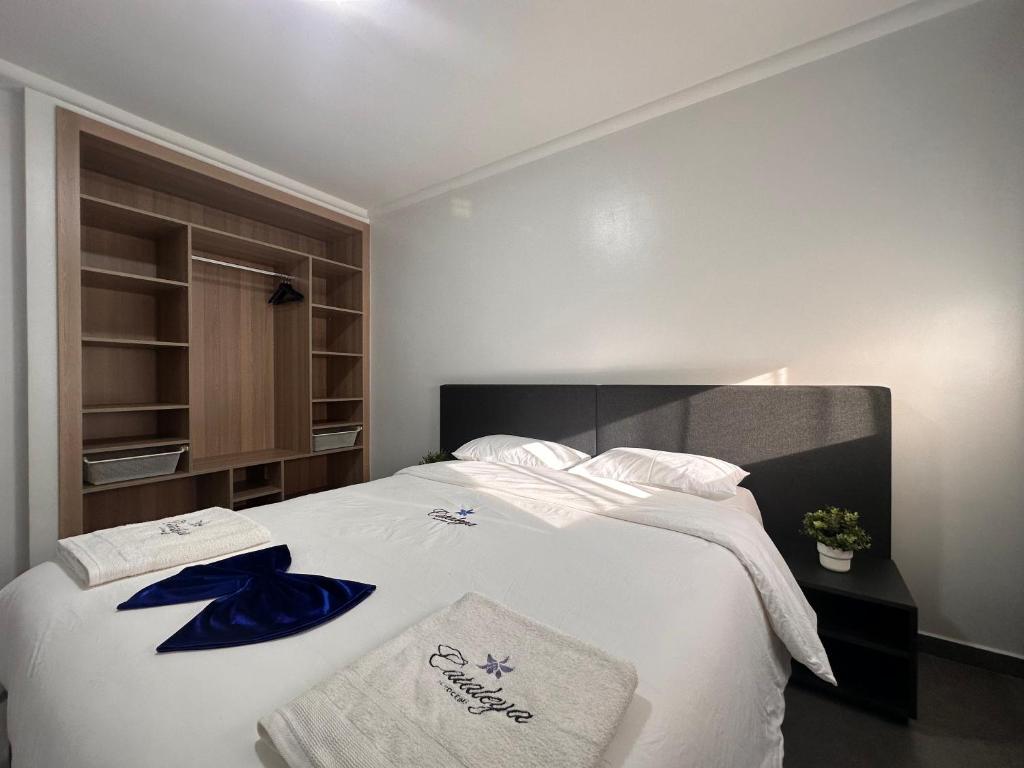 Postel nebo postele na pokoji v ubytování Hotel Cataleya Al-Hoceima
