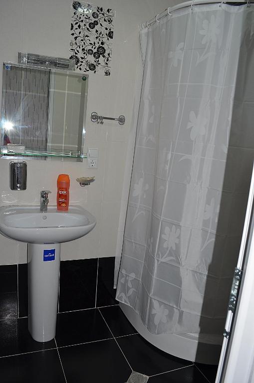 Koupelna v ubytování Hotel Okriba