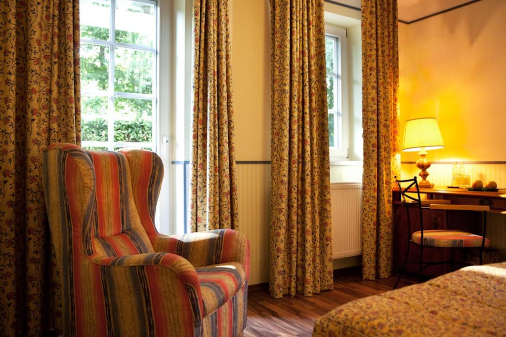 Postel nebo postele na pokoji v ubytování Landgasthof & Hotel Jagdhof