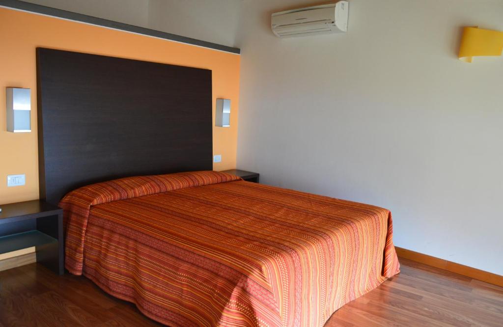 Postel nebo postele na pokoji v ubytování Hotel Garni Selene