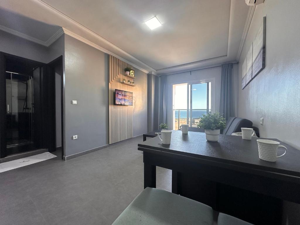 TV a/nebo společenská místnost v ubytování Hotel Cataleya Al-Hoceima