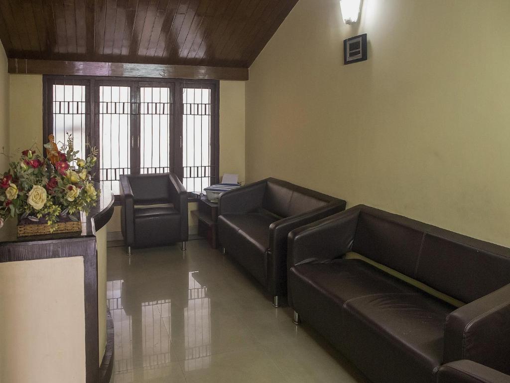 Posezení v ubytování Hotel O Sai Leela