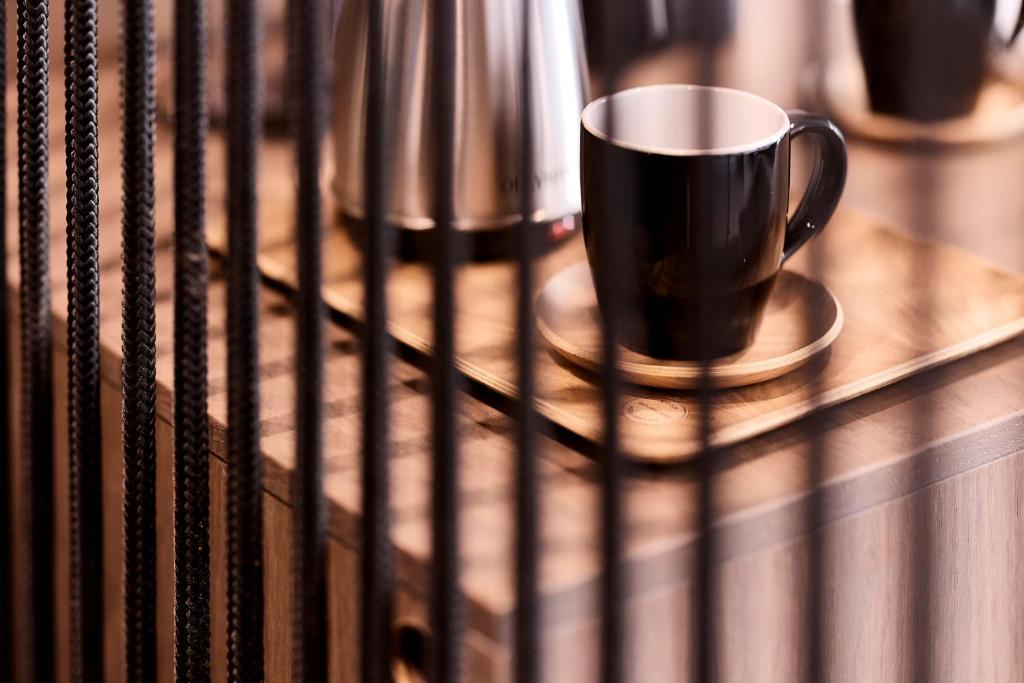 Příslušenství pro přípravu čaje a kávy v ubytování Athenarum Portus Life & Style Hotel