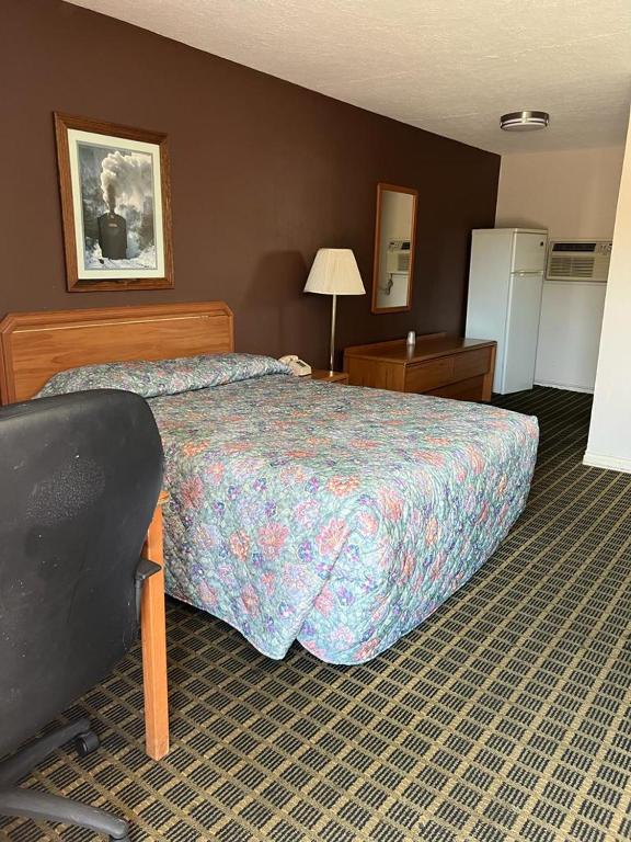 Postel nebo postele na pokoji v ubytování Aaron Motel