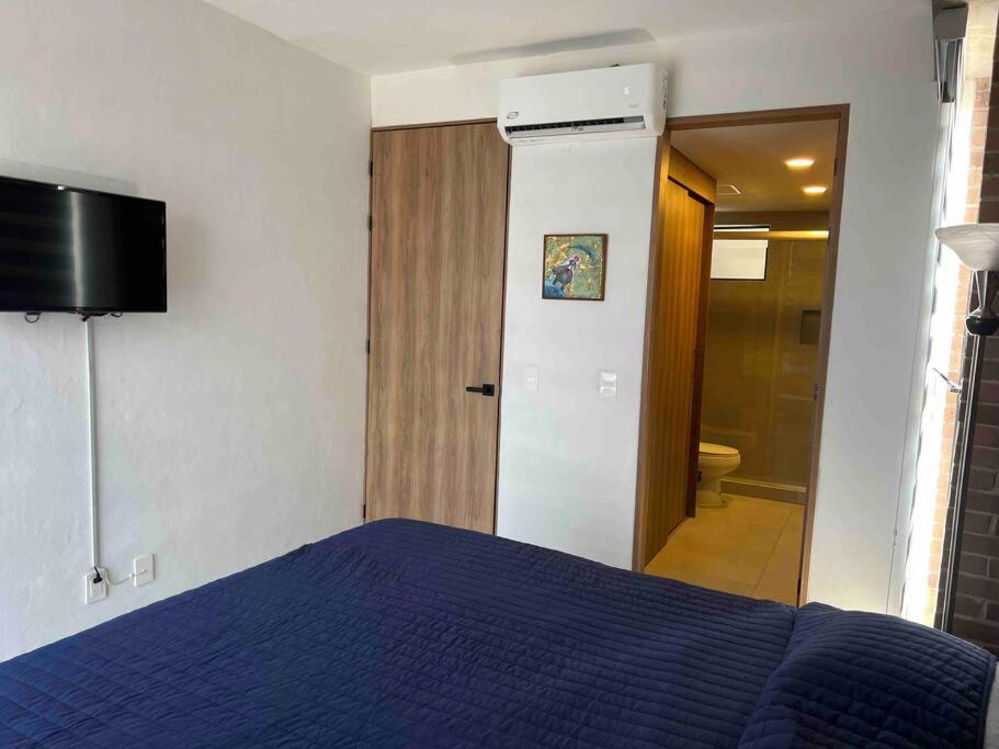 Postel nebo postele na pokoji v ubytování Departamento centrico