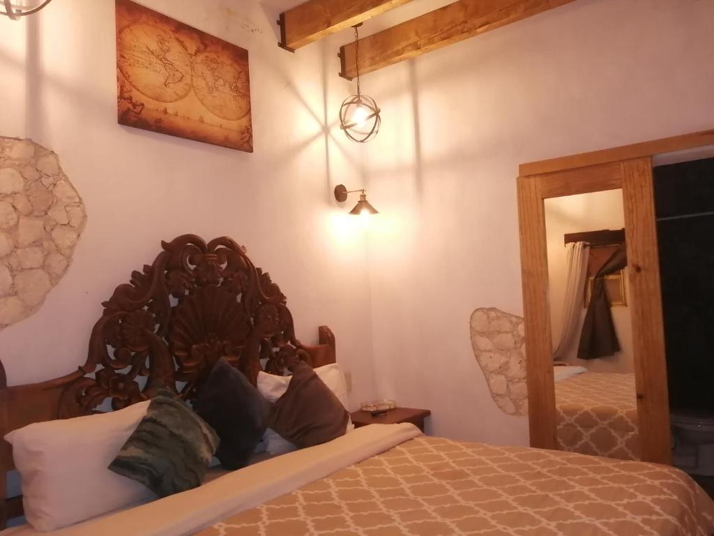Postel nebo postele na pokoji v ubytování Villas del Sol