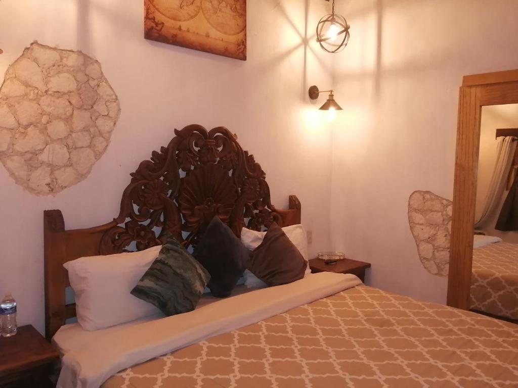 Postel nebo postele na pokoji v ubytování Villas del Sol