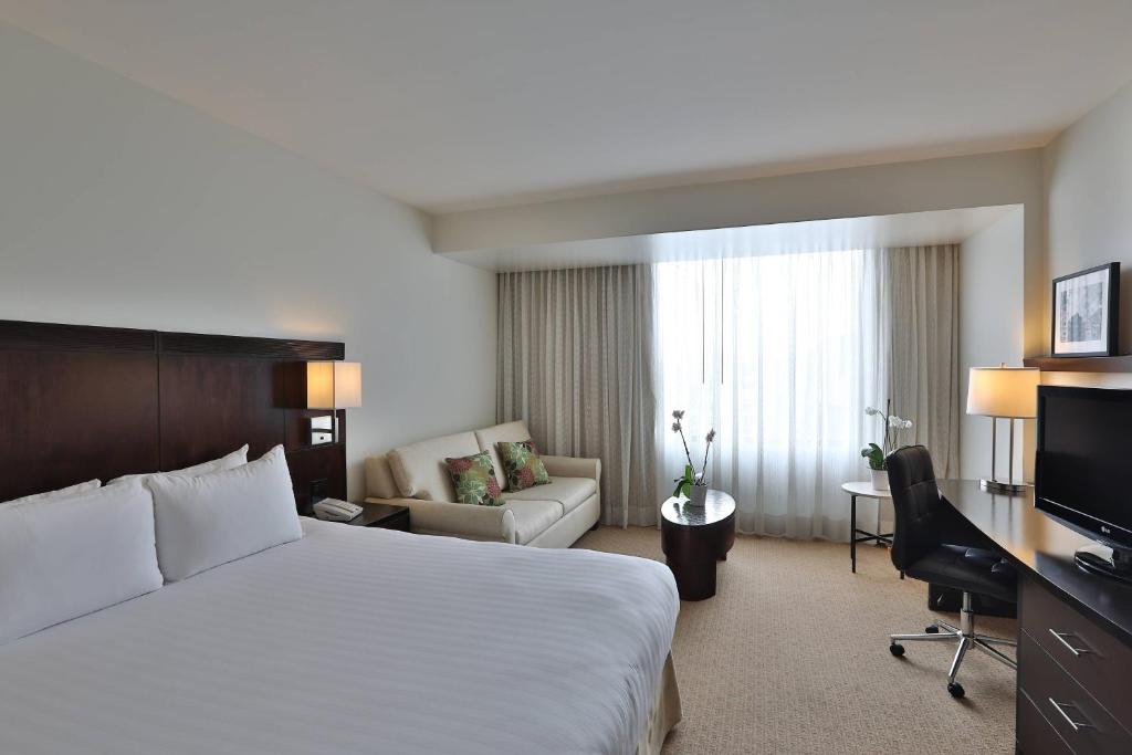 Postel nebo postele na pokoji v ubytování Courtyard by Marriott Panama Metromall