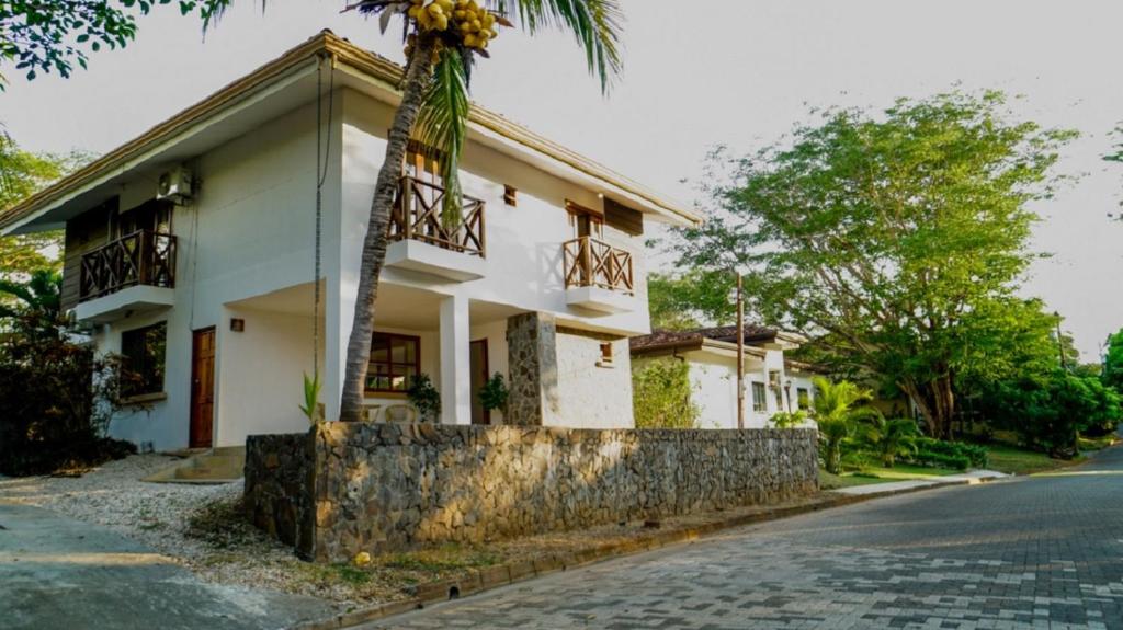 a house on the side of the road at Casa tropical - Fabulous tropical house in Tamarindo