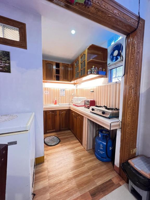 Kuchyň nebo kuchyňský kout v ubytování JMCL RESIDENCES