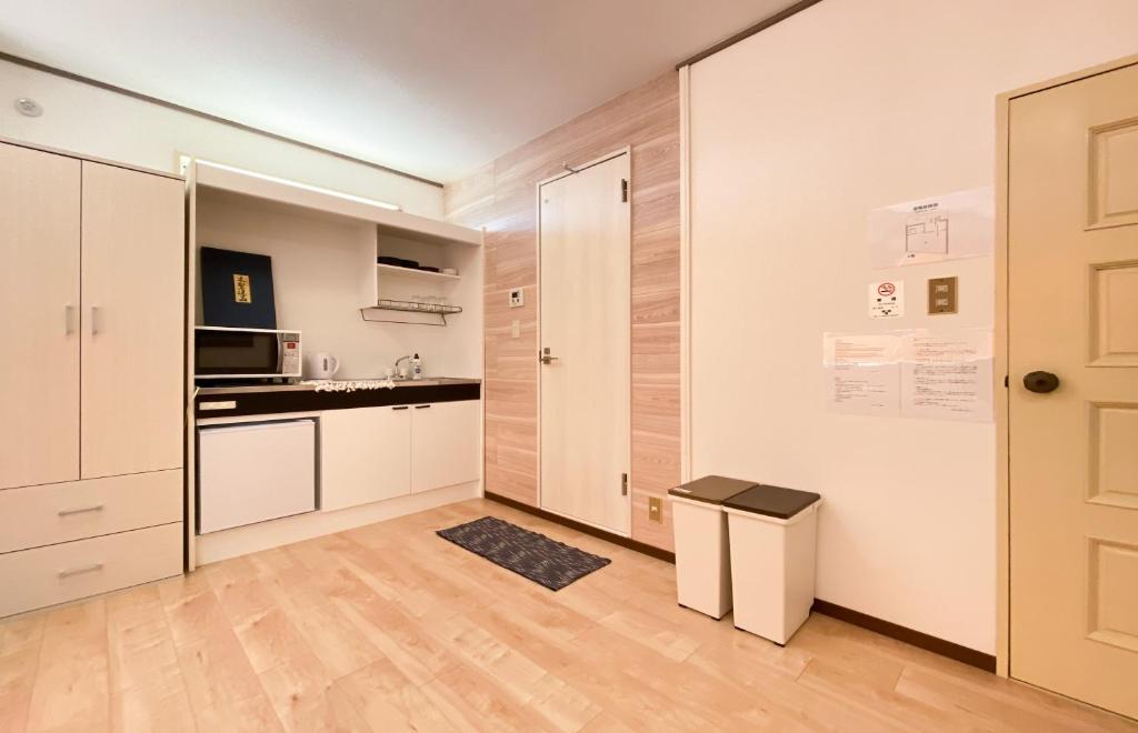Kuchyň nebo kuchyňský kout v ubytování Mitomi Home 4F