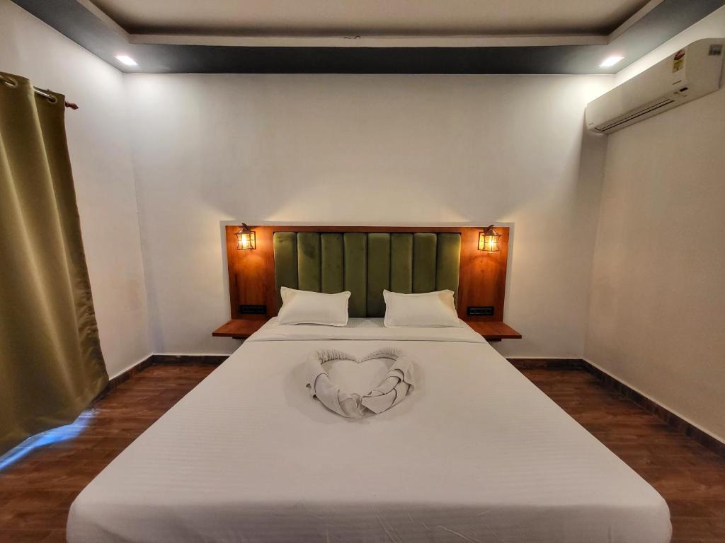 Postel nebo postele na pokoji v ubytování Rashiva Resort