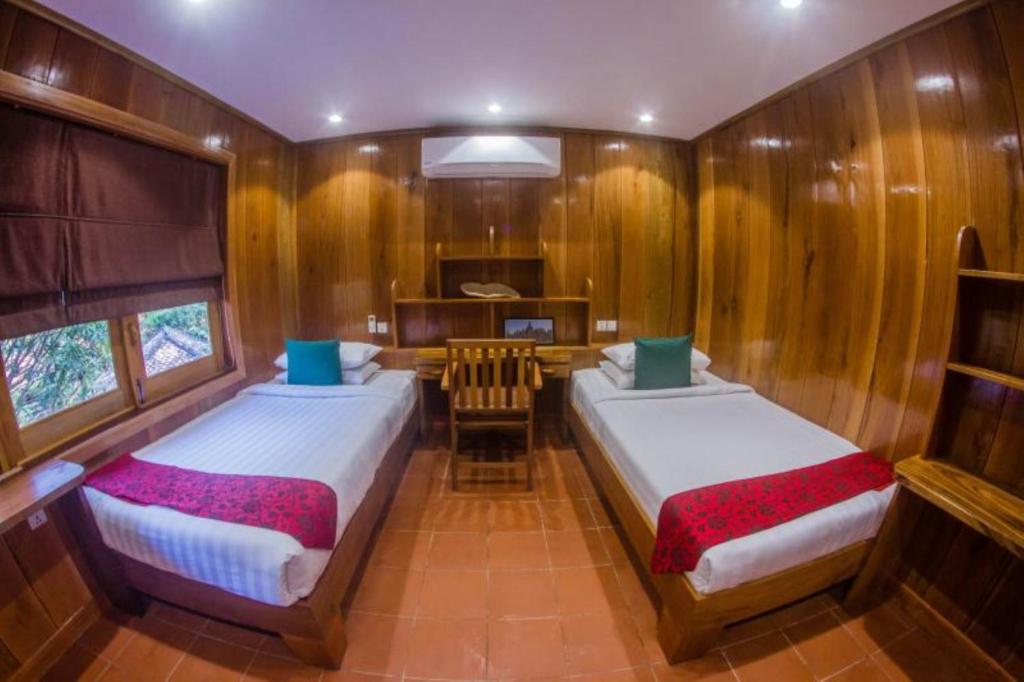 Postel nebo postele na pokoji v ubytování Veranda Natural Resort