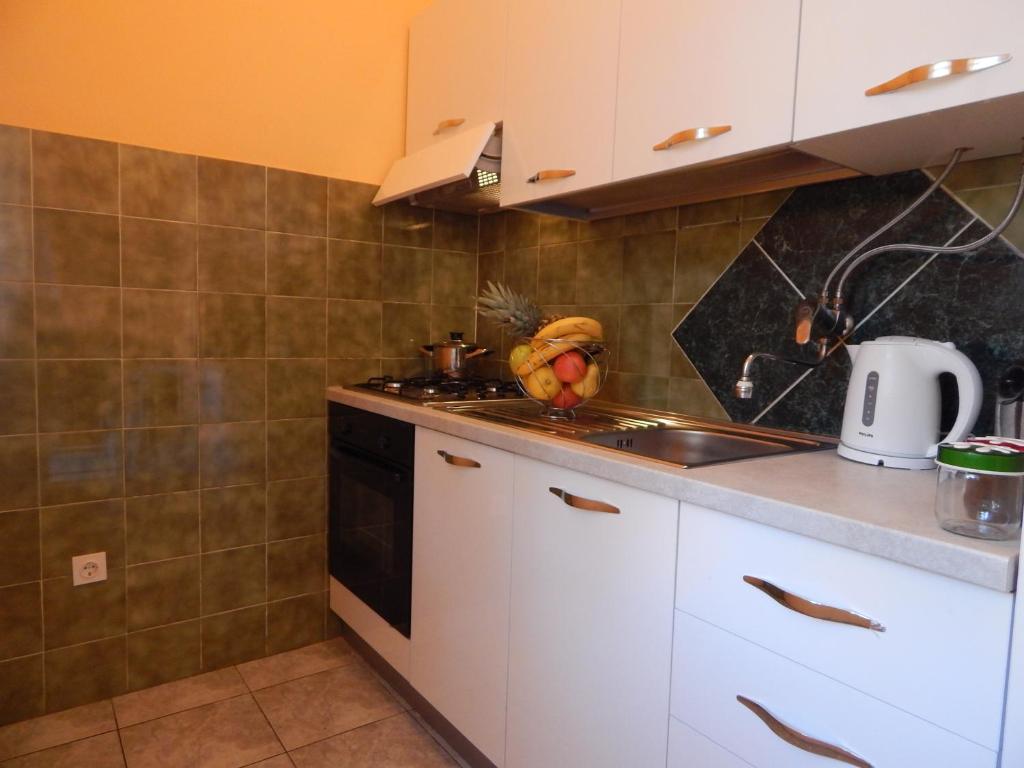 Kuchyň nebo kuchyňský kout v ubytování Apartment Nina Marie