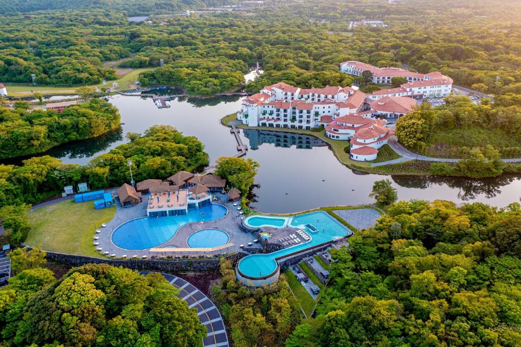 an aerial view of a resort on a river at Ecoland Hotel in Jeju