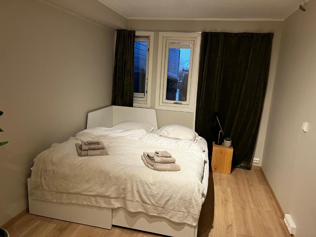 Postel nebo postele na pokoji v ubytování Nydelig rekkehus med en av byens beste utsikter!