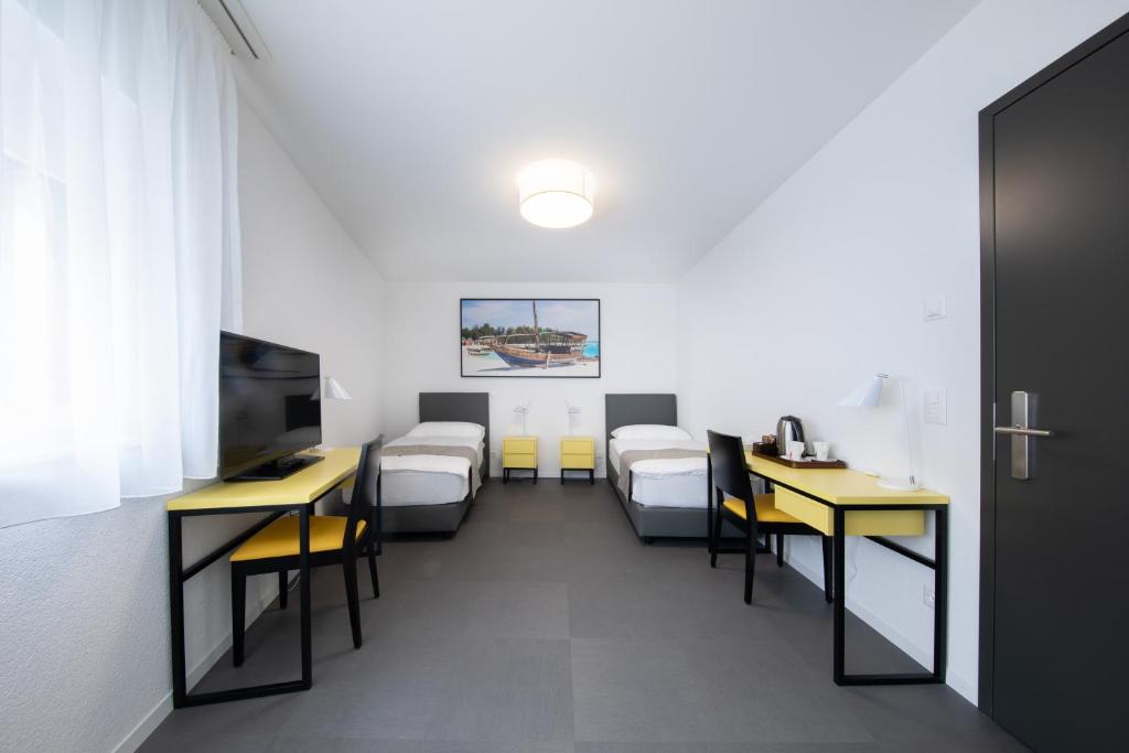 TV in/ali zabaviščno središče v nastanitvi "The Freddie Mercury" Hotel