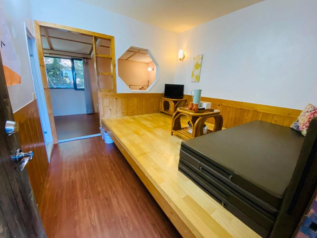 TV a/nebo společenská místnost v ubytování Shan Shui-Yuan Vege Guest House