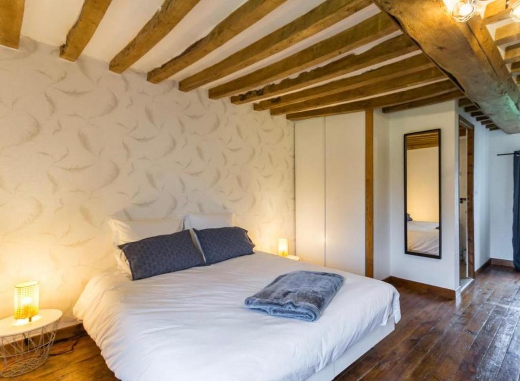 Postel nebo postele na pokoji v ubytování L'Îlot Pomme Cottage