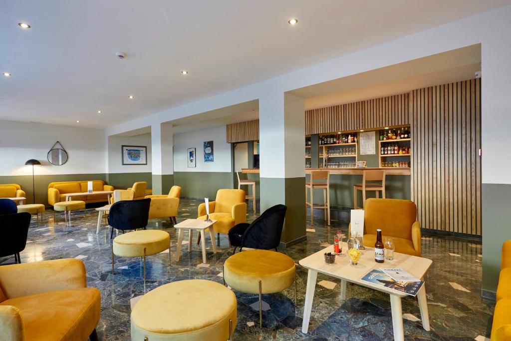 Posezení v ubytování Hôtel Eliova l'Eau Vive