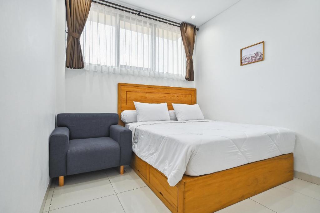 Postel nebo postele na pokoji v ubytování Bangreng Inn Hotel