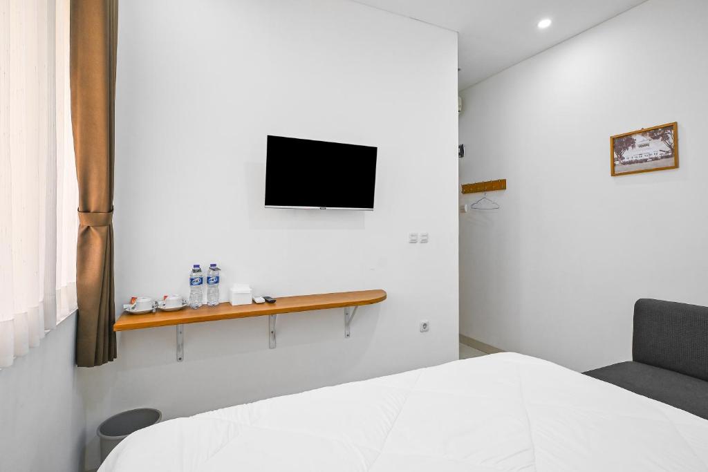 TV a/nebo společenská místnost v ubytování Bangreng Inn Hotel