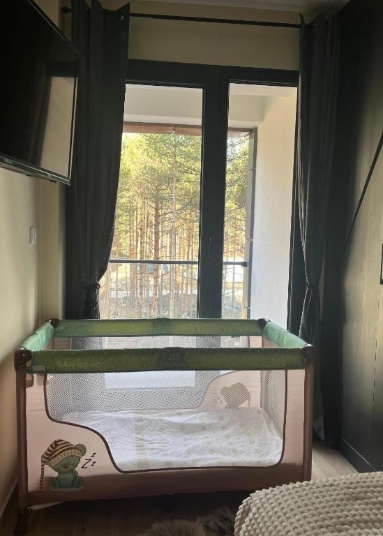 Postel nebo postele na pokoji v ubytování Apartman Aspen Divcibare