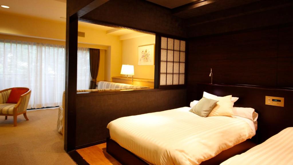 Postel nebo postele na pokoji v ubytování Hotel Cypress Karuizawa