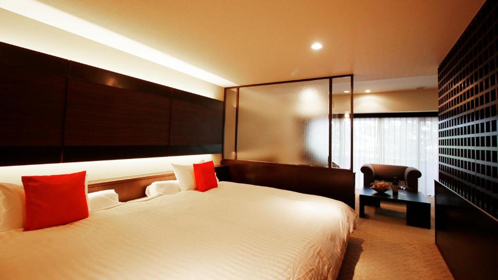 Postel nebo postele na pokoji v ubytování Hotel Cypress Karuizawa