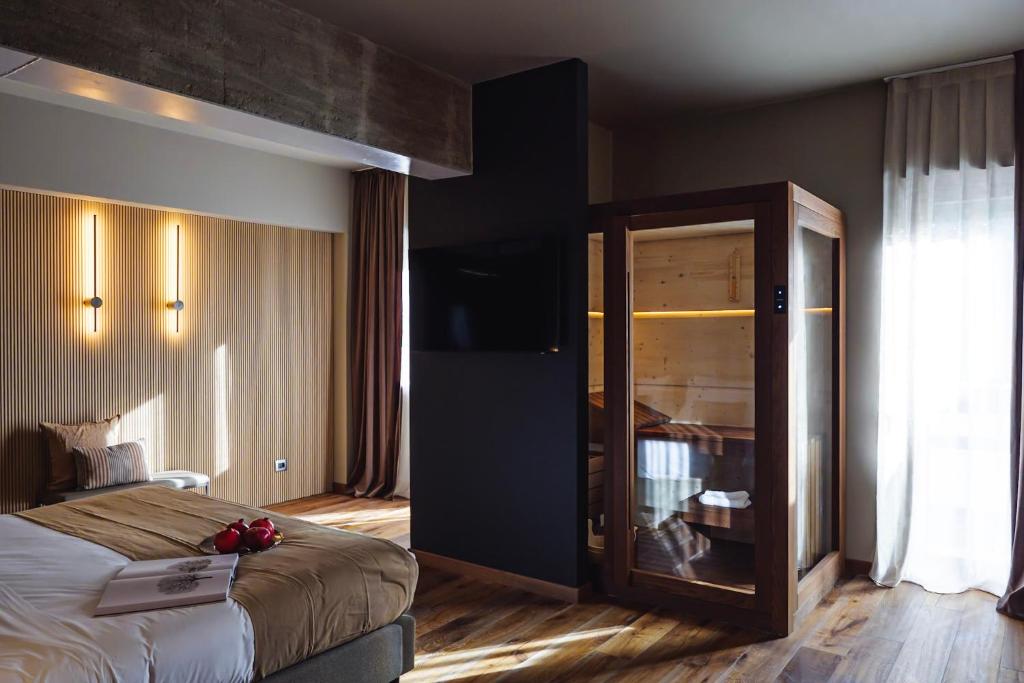 Postel nebo postele na pokoji v ubytování Albergo La Pace