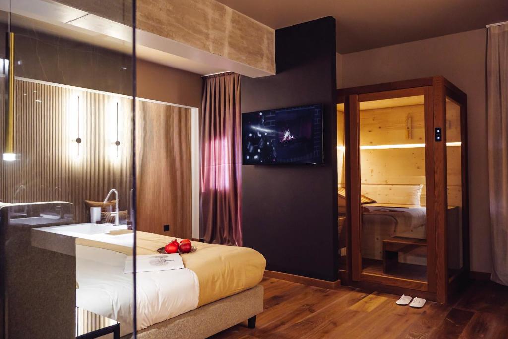 Postel nebo postele na pokoji v ubytování Albergo La Pace