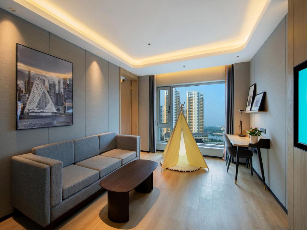 Park Inn by Radisson Shaoxing China Keqiao - Family Suite Met Balthema