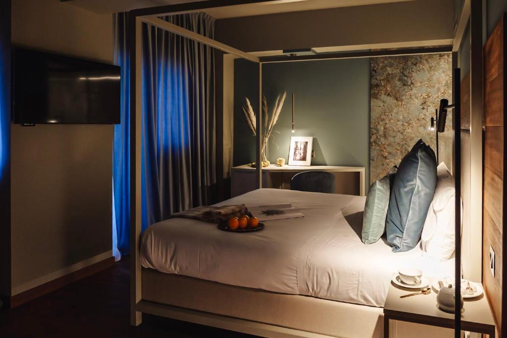 Postel nebo postele na pokoji v ubytování Albergo La Pace