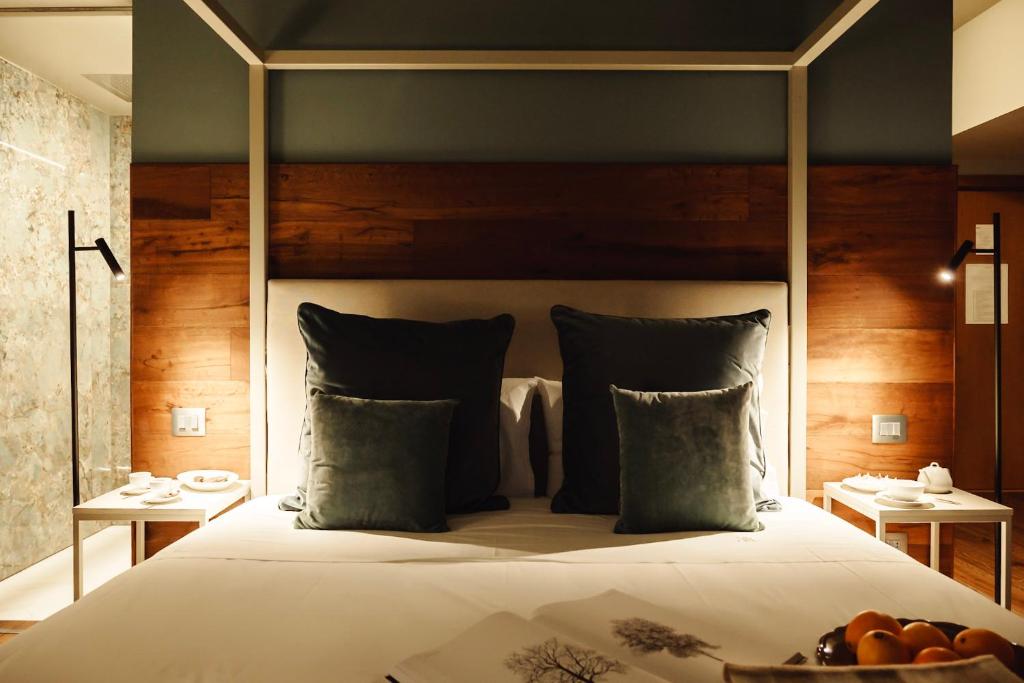 Postel nebo postele na pokoji v ubytování Albergo La Pace