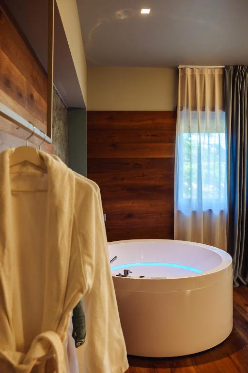 Postel nebo postele na pokoji v ubytování Albergo La Pace