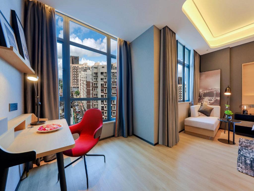 Postel nebo postele na pokoji v ubytování Park Inn by Radisson Zhuhai Gaolan Port