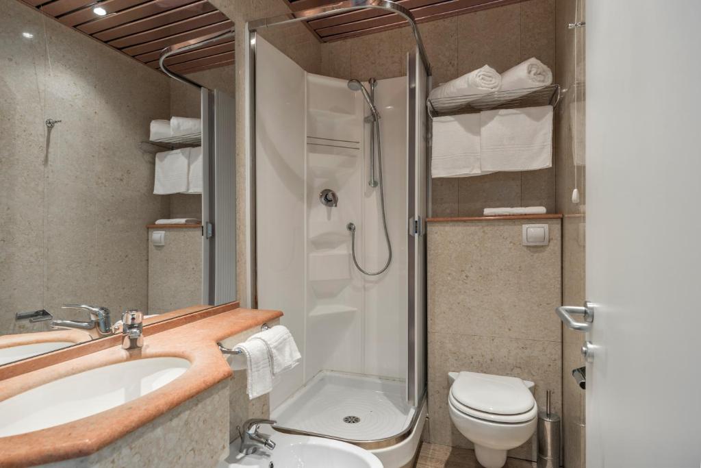 Koupelna v ubytování Albergo La Pace