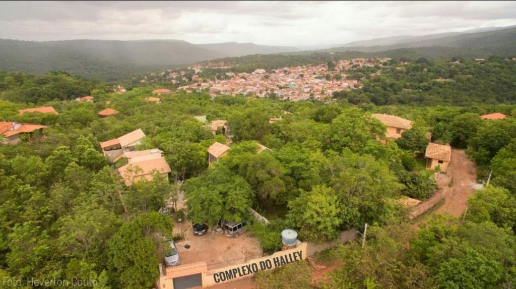 an aerial view of a village with trees and buildings at Complexo Halley in Lençóis