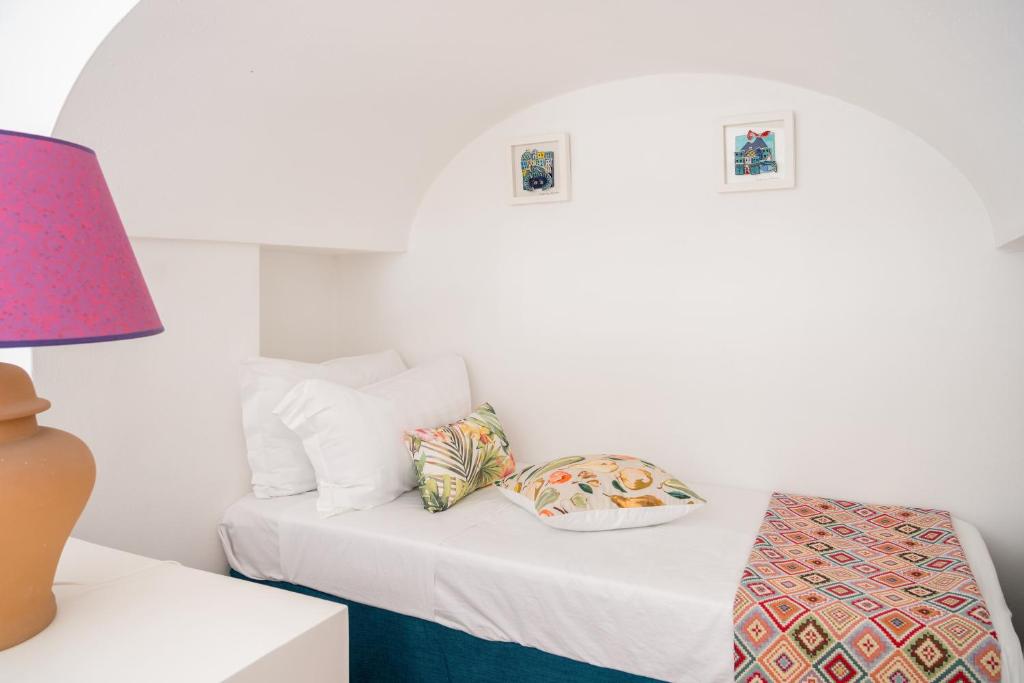Postel nebo postele na pokoji v ubytování Villa Borboleta by Elite Villas