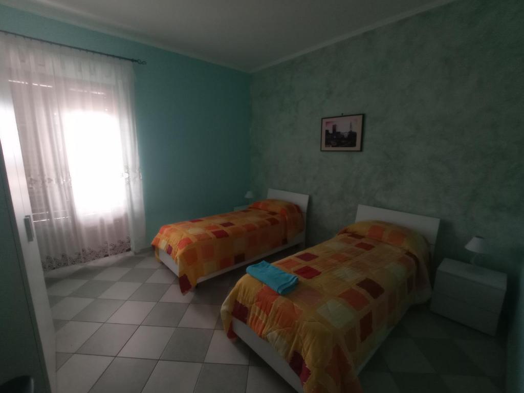 Cama o camas de una habitación en Casa Nostra